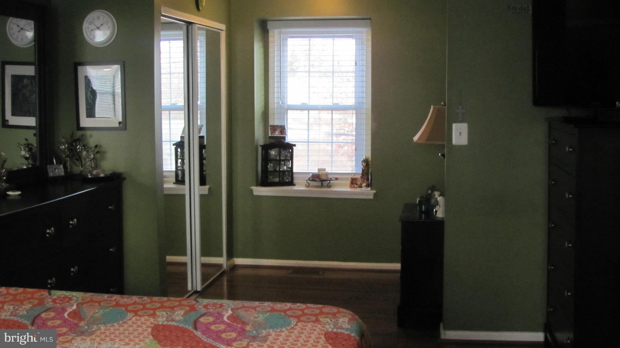 2929 Gracefield Road Silver Spring, MD 20904 - Photo 7 of 25 a bedroom with a bed and a window