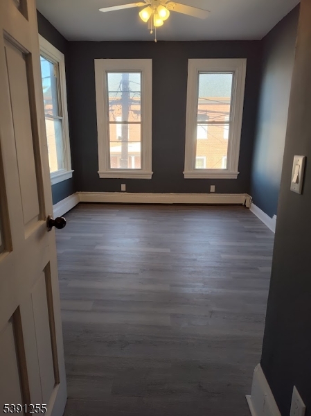 304 Front Street, Unit 4B Belvidere, NJ 07823 - Photo 2 of 8 an empty room with windows