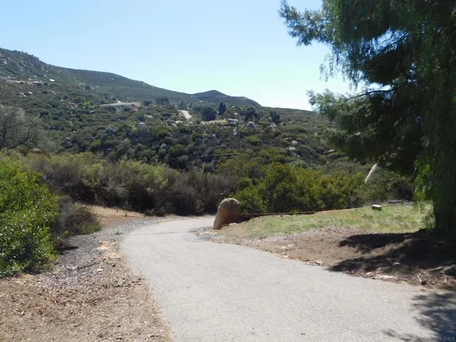 a view of a house in a field