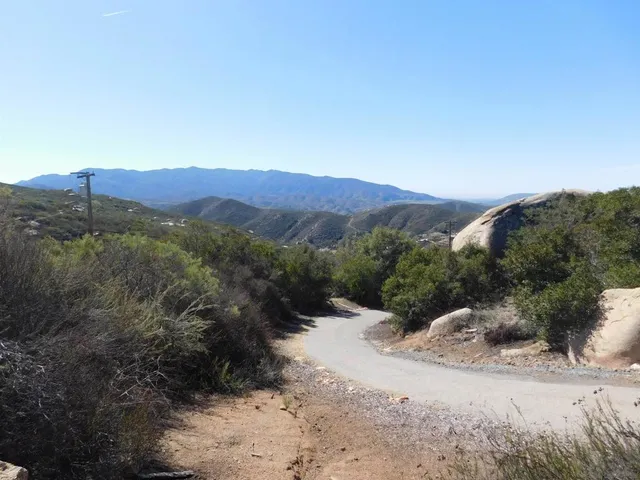 a view of a backyard of a house