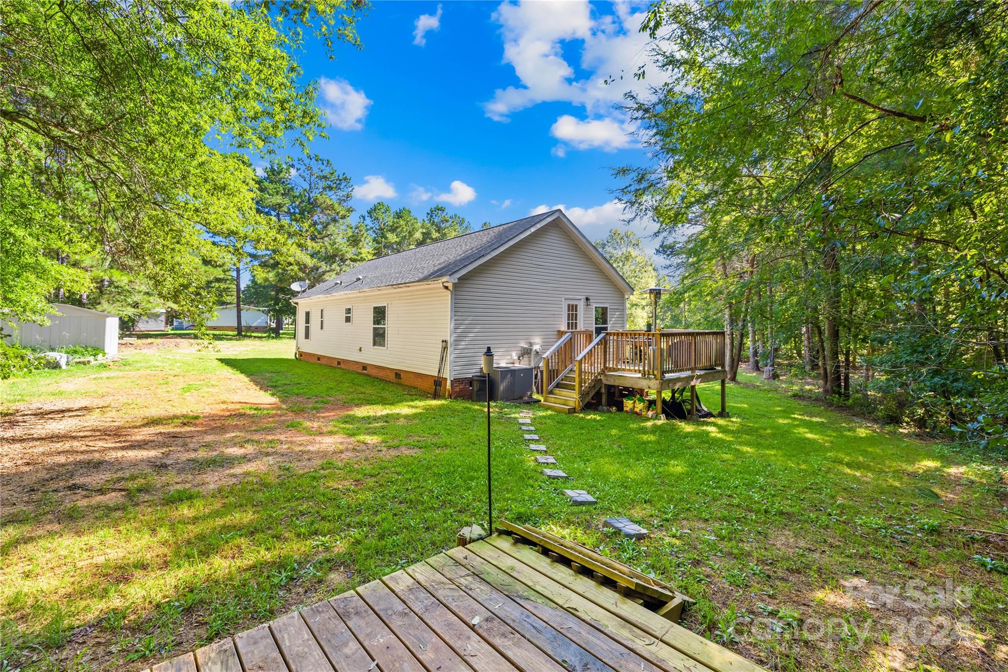 1335 Old York Road Chester, SC 29706 - Photo 27 of 33 a backyard of a house with table and chairs
