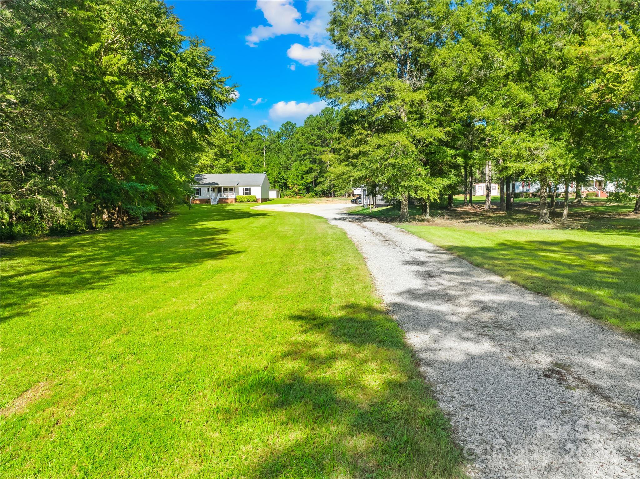 1335 Old York Road Chester, SC 29706 - Photo 4 of 33 a view of yard with swimming pool and green space