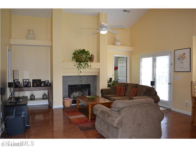 4235 Beacon Ridge Drive High Point, NC 27265 - Photo 2 of 16 Living Room. Wow! The living room features a gorgeous fireplace, built in plant shelves, and a soaring ceiling!
