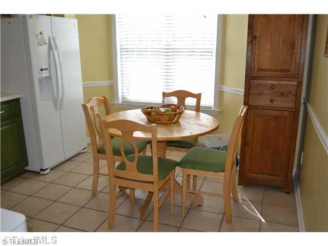 4235 Beacon Ridge Drive High Point, NC 27265 - Photo 5 of 16 Breakfast. Enjoy your morning cup of coffee in the bright and sunny eat-in kitchen!