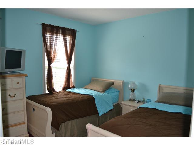 4235 Beacon Ridge Drive High Point, NC 27265 - Photo 6 of 16 2nd Bedroom. A room large enough for two! The second bedroom is located at the front of the home!