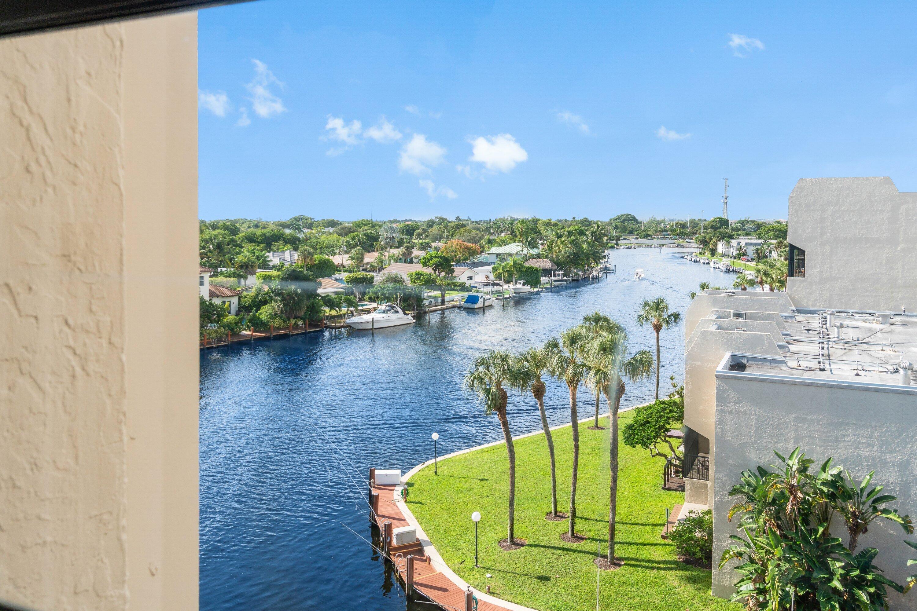 15 Royal Palm Way, Unit 604 Boca Raton, FL 33432 - Photo 20 of 41 a view of a swimming pool with a lake view