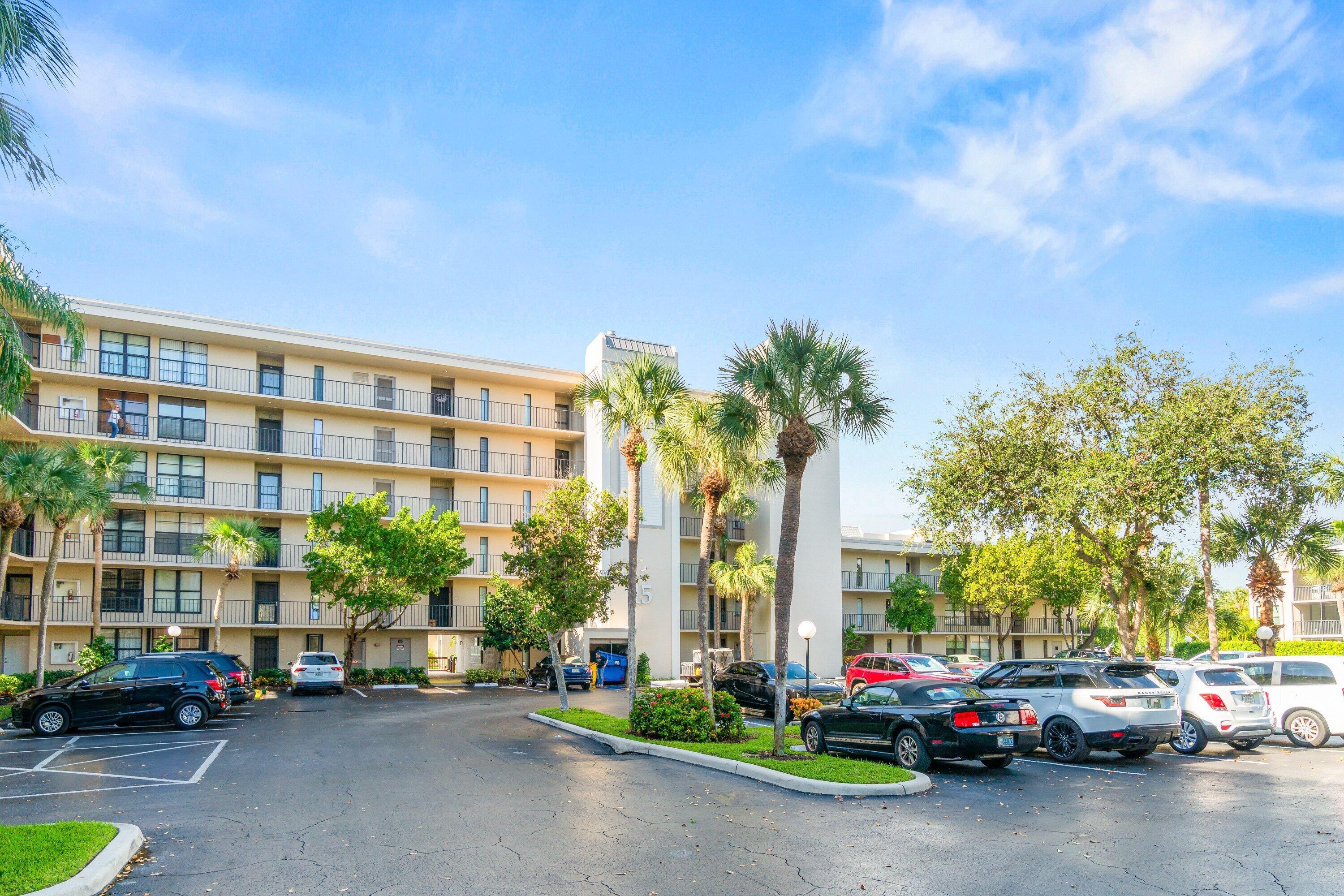 15 Royal Palm Way, Unit 604 Boca Raton, FL 33432 - Photo 2 of 41 a cars parked in front of a building