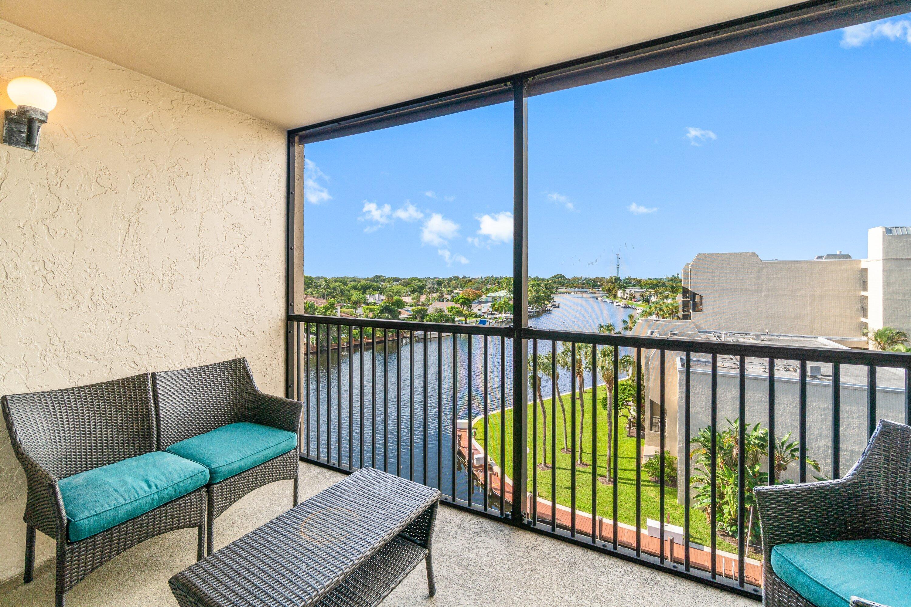15 Royal Palm Way, Unit 604 Boca Raton, FL 33432 - Photo 25 of 41 a balcony with furniture