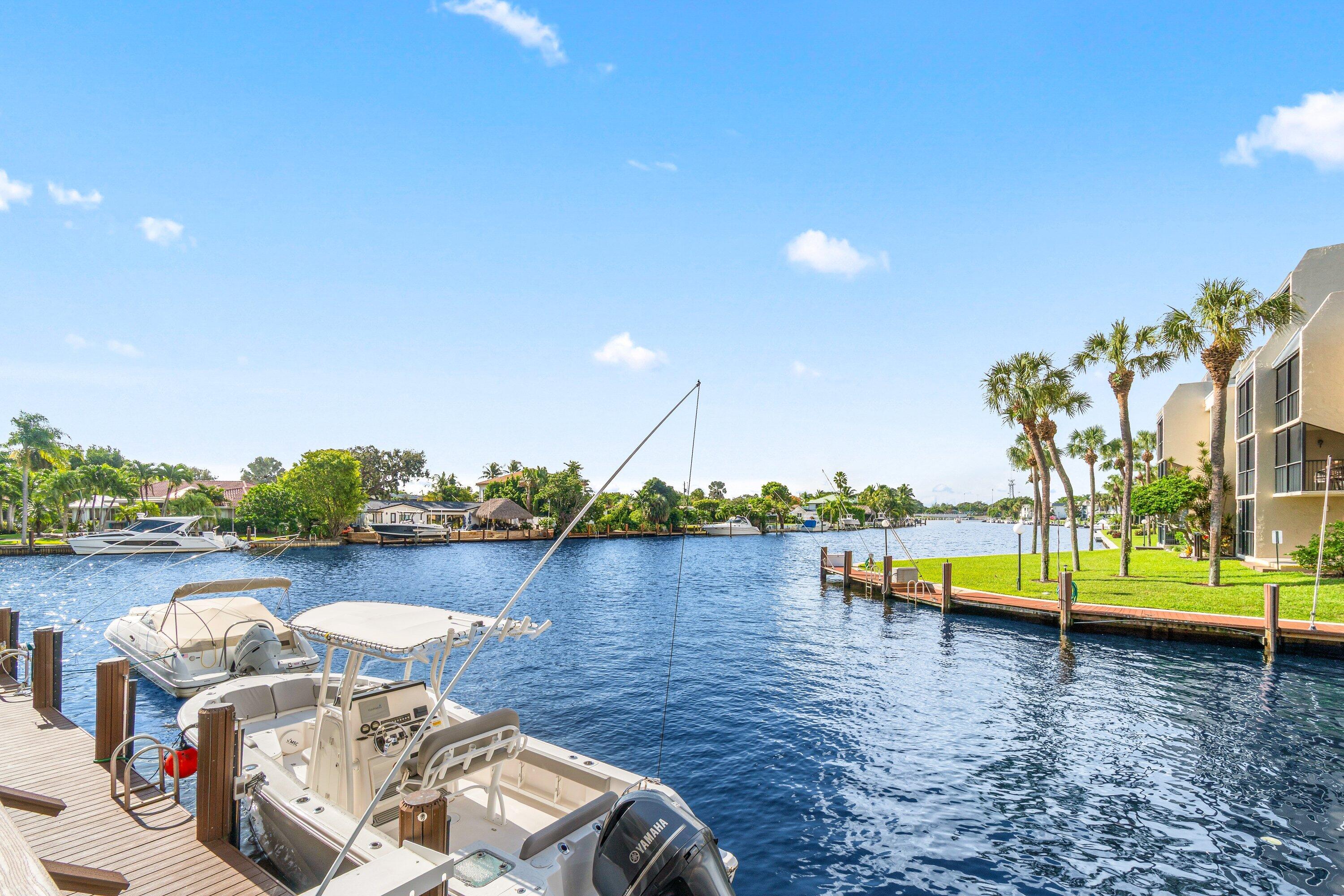 15 Royal Palm Way, Unit 604 Boca Raton, FL 33432 - Photo 32 of 41 a view of a lake with houses
