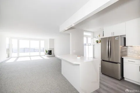 a view of closet area with stairs