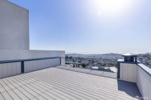 a view of a city with tall buildings