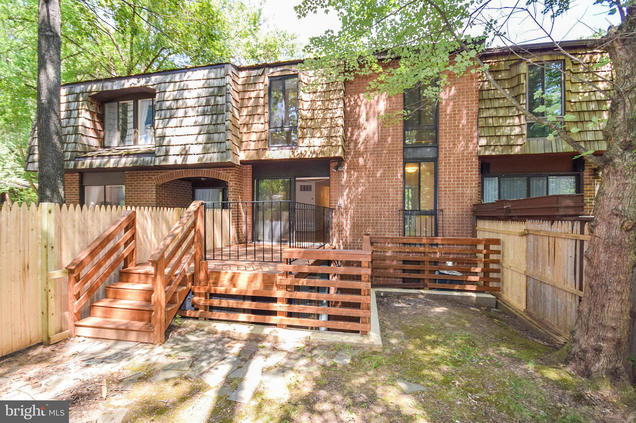 7980 Inverness Ridge Road Potomac, MD 20854 - Photo 23 of 36 Beautiful deck with stairs to private backyard