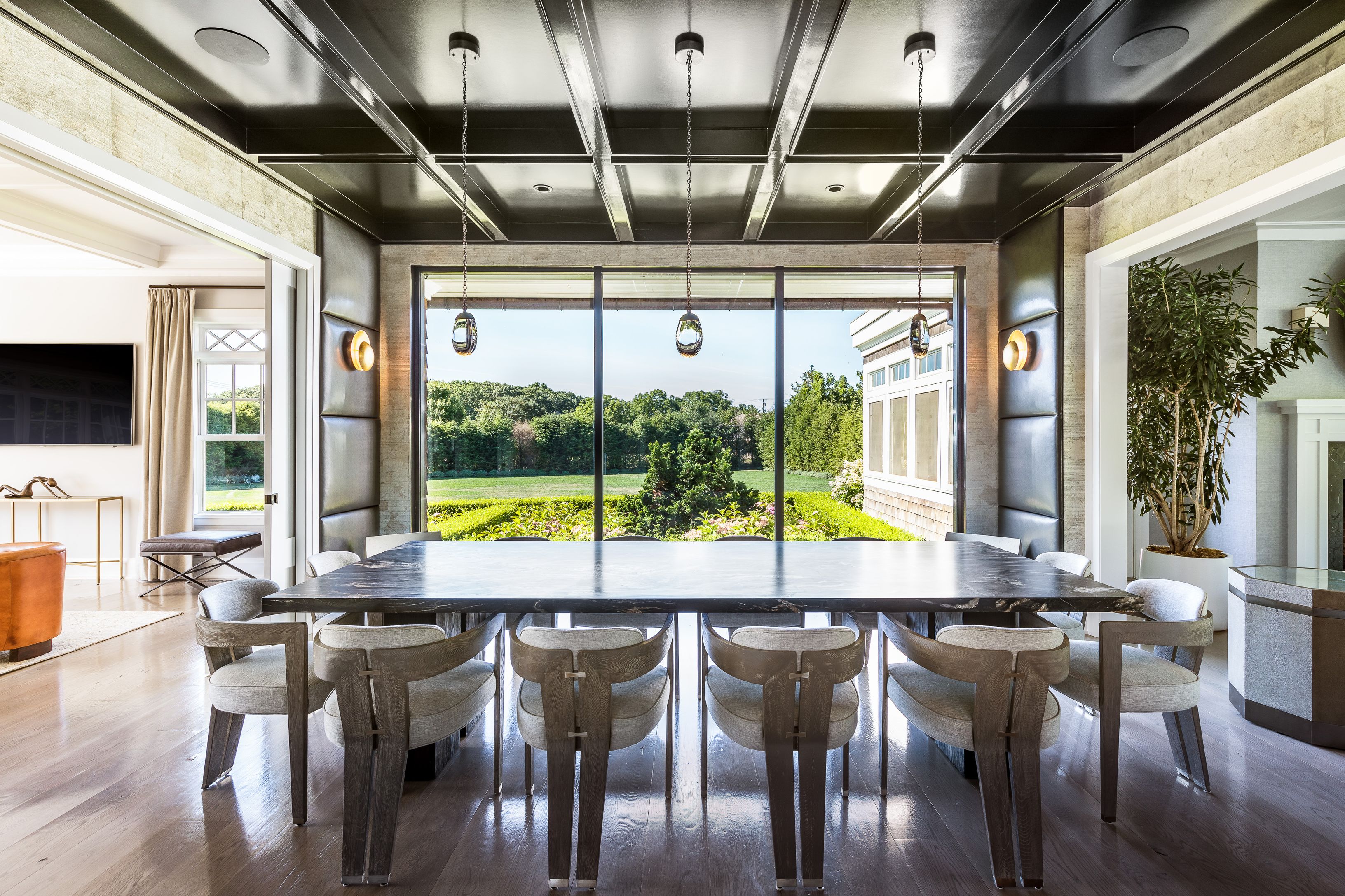 900 Head Of Pond Road Water Mill, NY 11976 - Photo 13 of 41 a large swimming pool with lawn chairs and chandelier