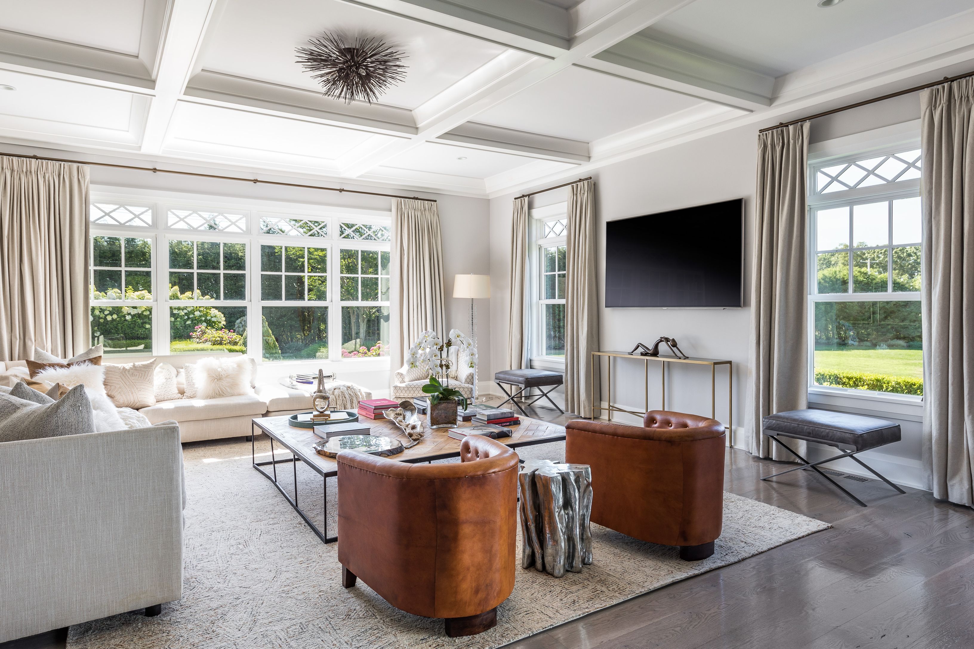 900 Head Of Pond Road Water Mill, NY 11976 - Photo 16 of 41 a living room with furniture and a flat screen tv