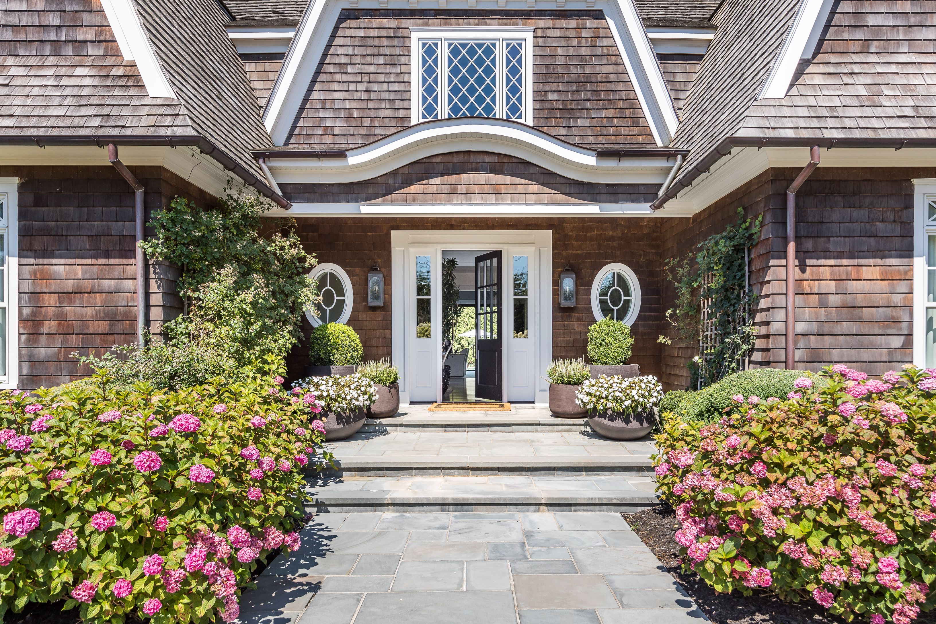 900 Head Of Pond Road Water Mill, NY 11976 - Photo 2 of 41 a front view of a house