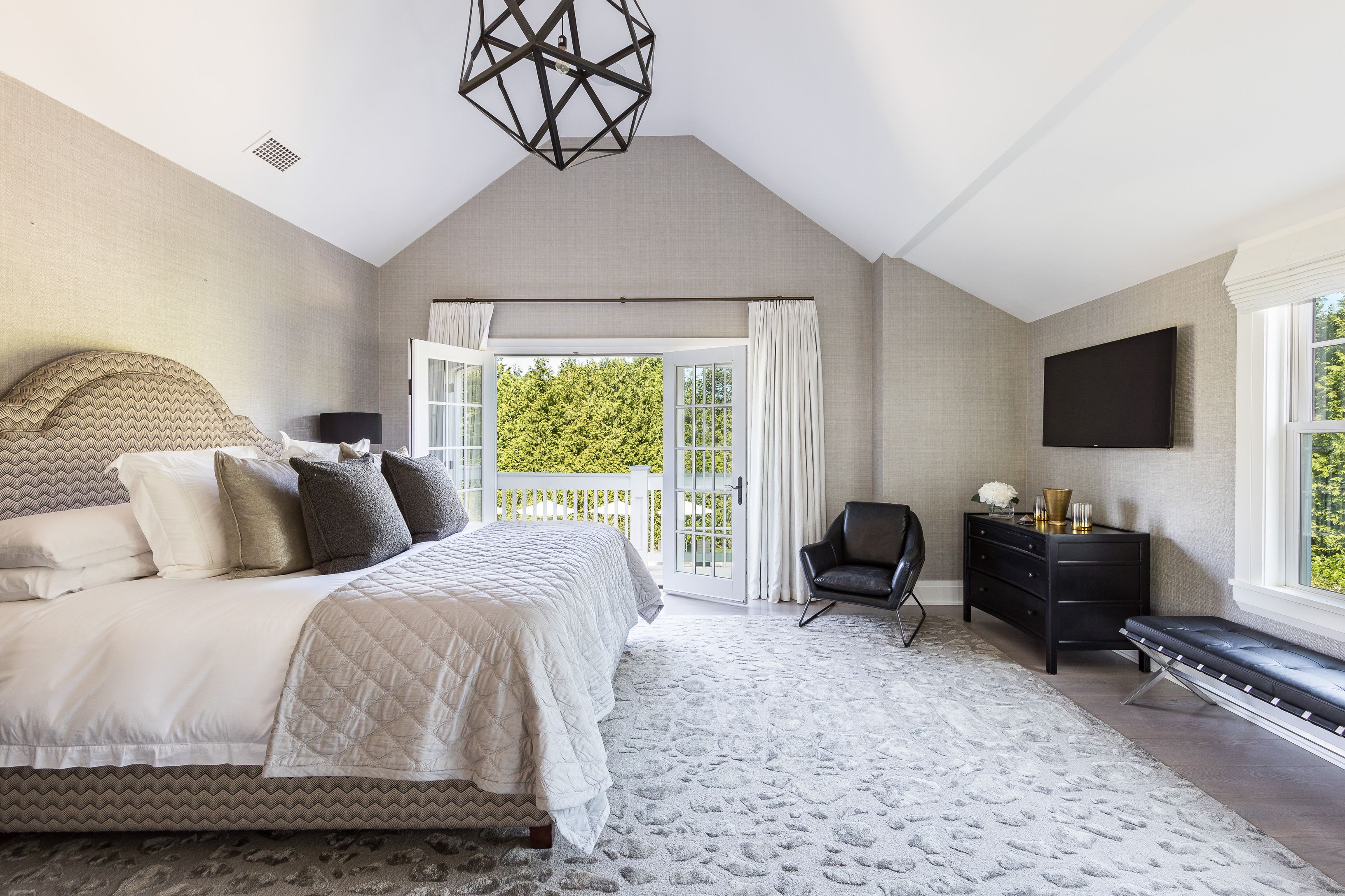 900 Head Of Pond Road Water Mill, NY 11976 - Photo 25 of 41 a bedroom with a bed and a couch