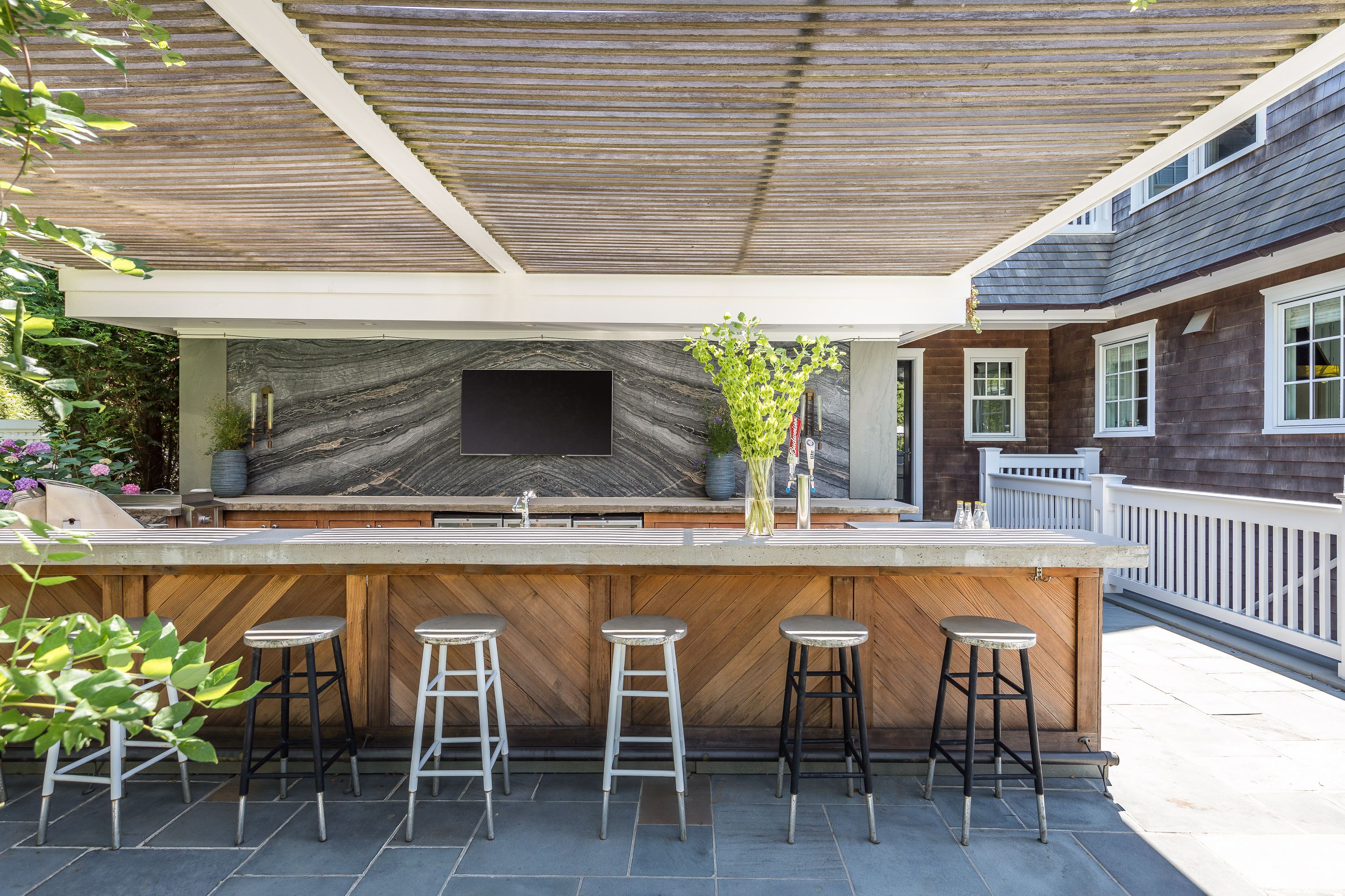 900 Head Of Pond Road Water Mill, NY 11976 - Photo 28 of 41 a view of a chairs and table in the patio