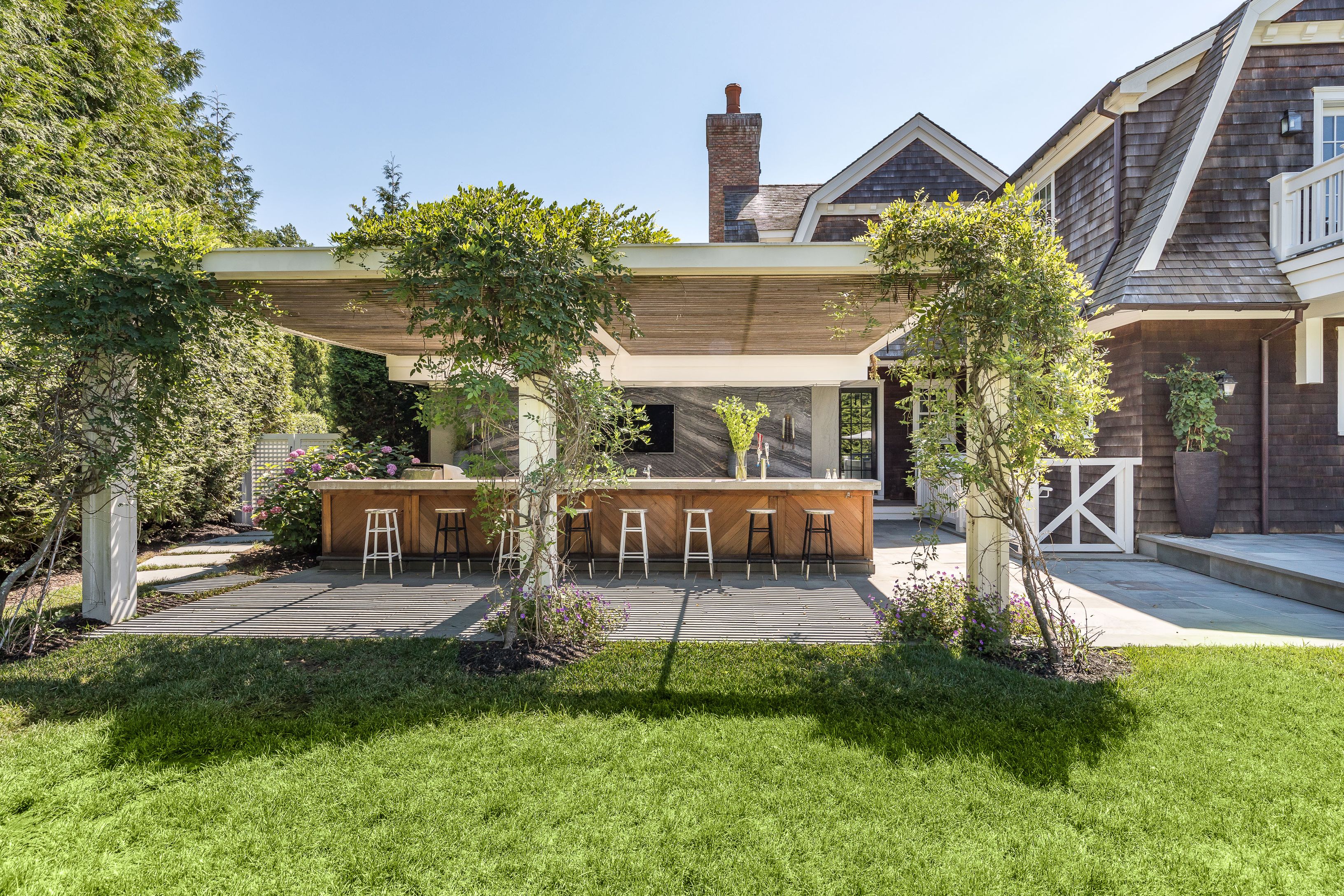 900 Head Of Pond Road Water Mill, NY 11976 - Photo 29 of 41 a view of a house with a yard porch and sitting area