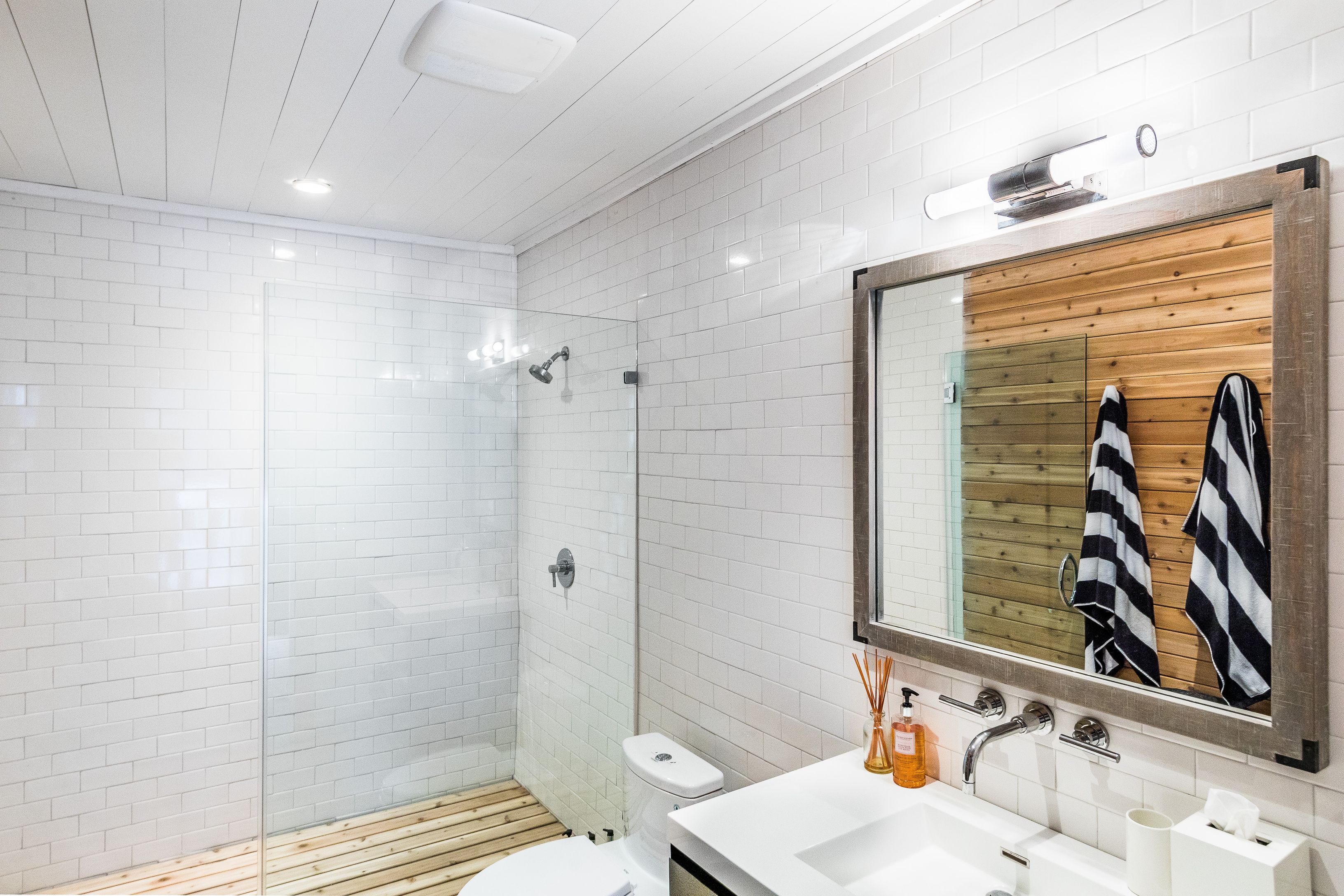 900 Head Of Pond Road Water Mill, NY 11976 - Photo 31 of 41 a bathroom with a sink and a shower