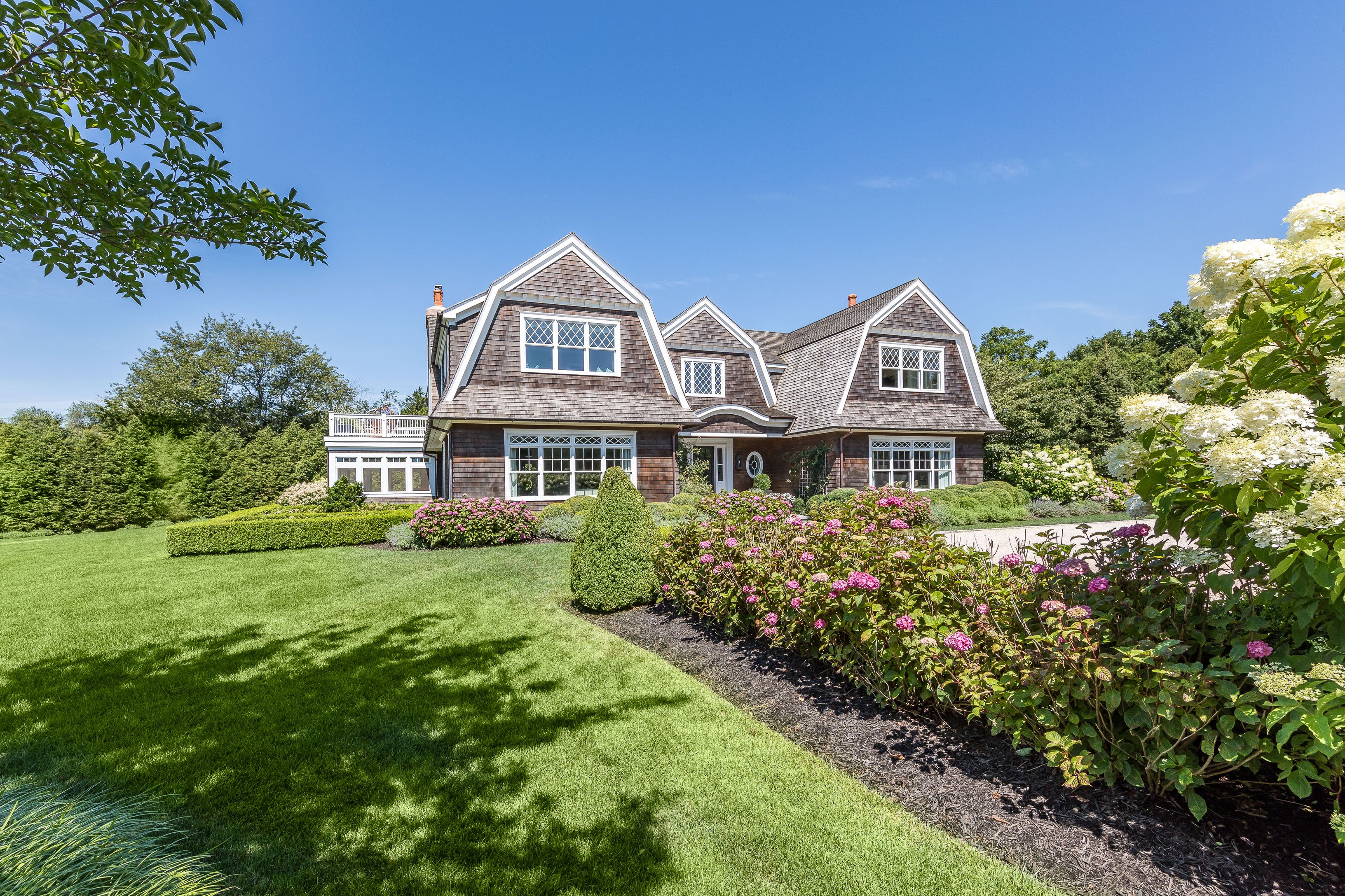 900 Head Of Pond Road Water Mill, NY 11976 - Photo 36 of 41 a front view of a house with a yard
