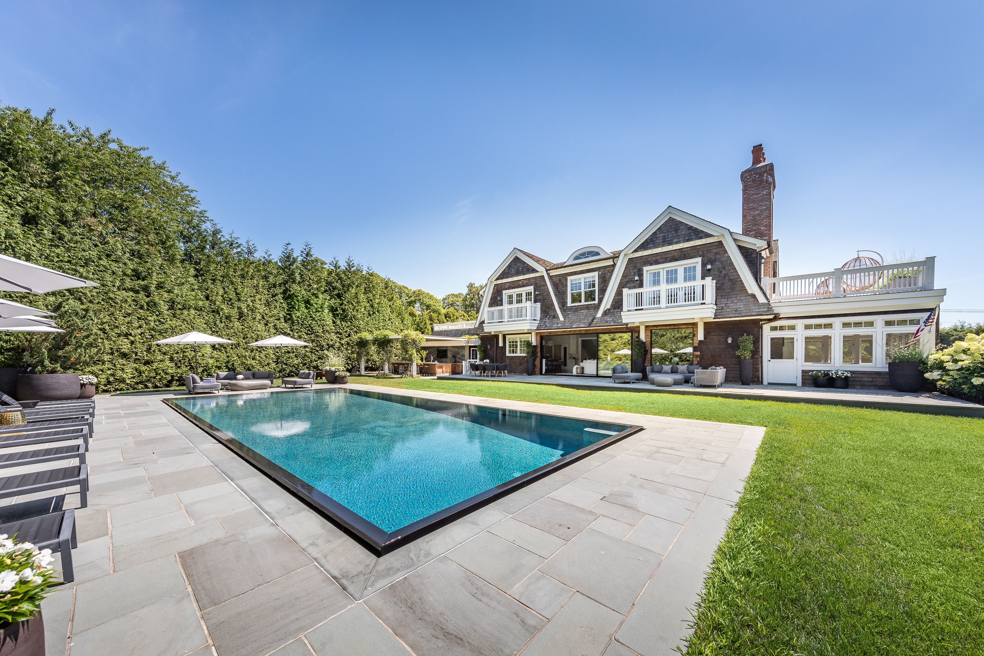 900 Head Of Pond Road Water Mill, NY 11976 - Photo 38 of 41 a view of a house with swimming pool and yard