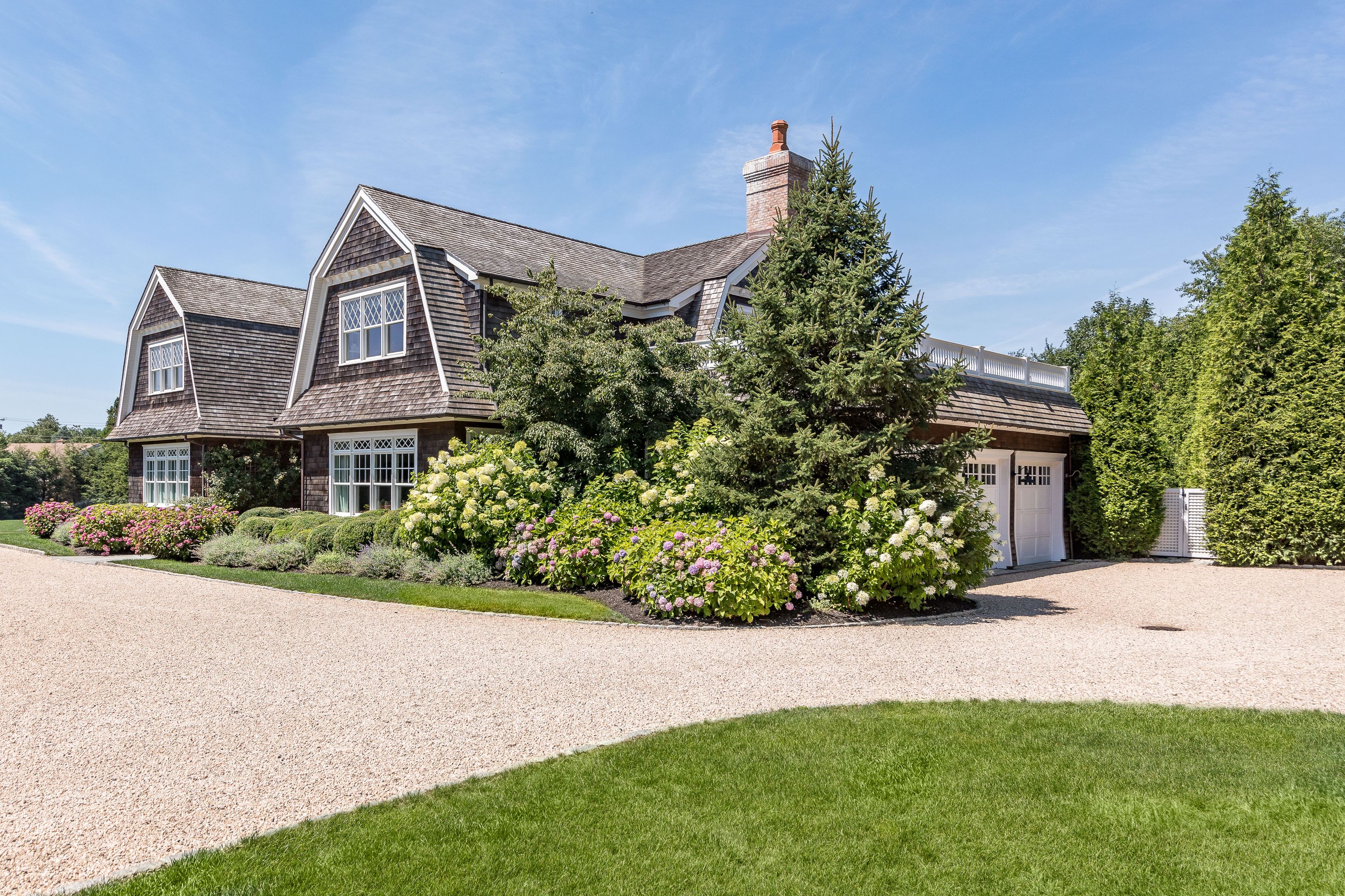 900 Head Of Pond Road Water Mill, NY 11976 - Photo 40 of 41 a front view of a house with a yard