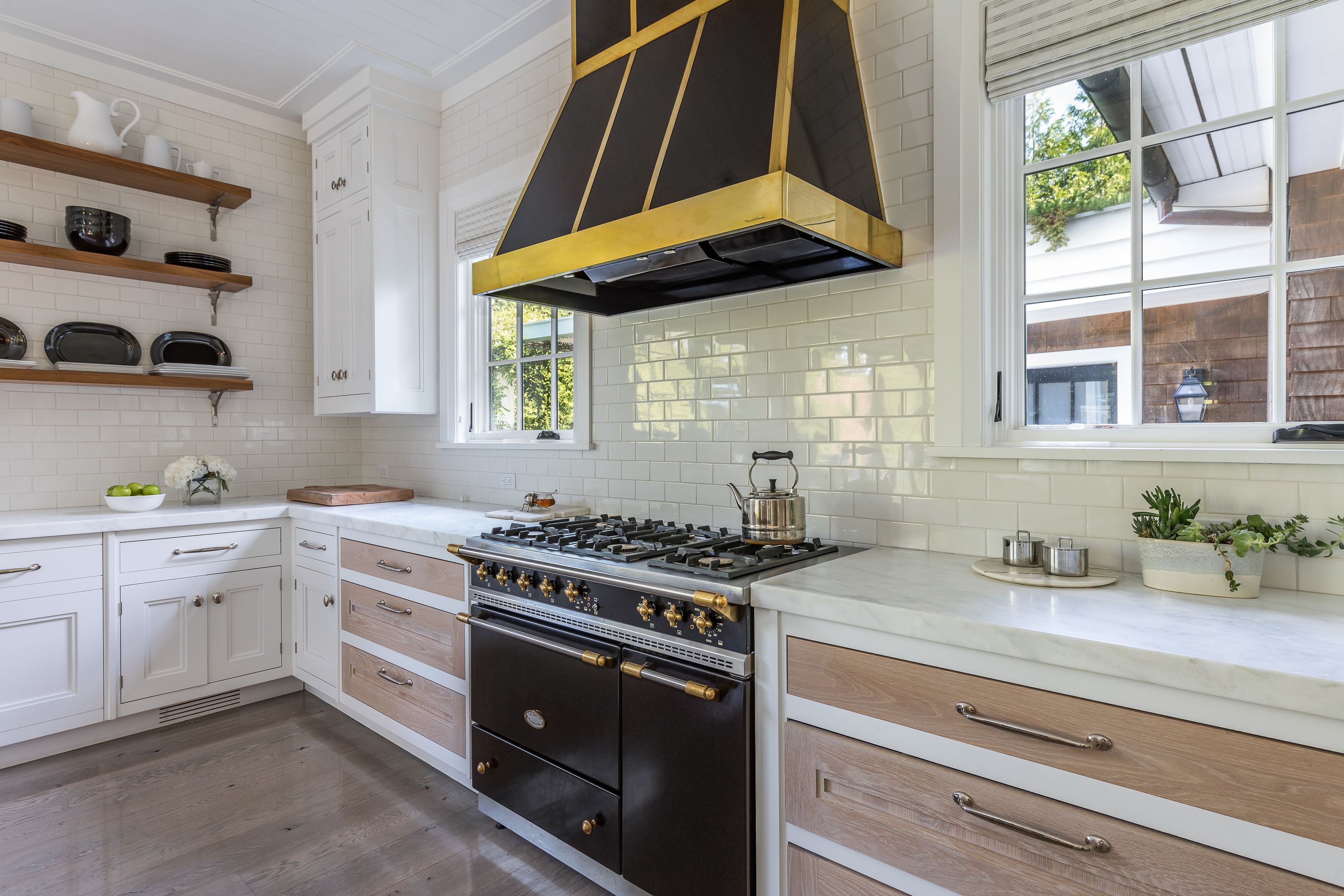 900 Head Of Pond Road Water Mill, NY 11976 - Photo 8 of 41 a kitchen with stainless steel appliances a stove a sink and a microwave