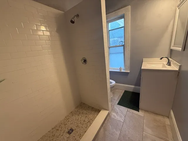 a bathroom with a sink and toilet