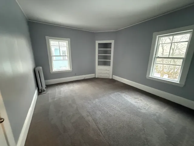 an empty room with windows
