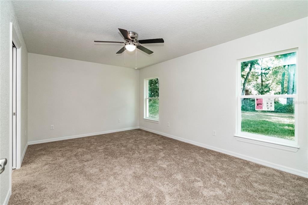 61 Larch Run Ocala, FL 34480 - Photo 11 of 26 a view of an empty room with a window