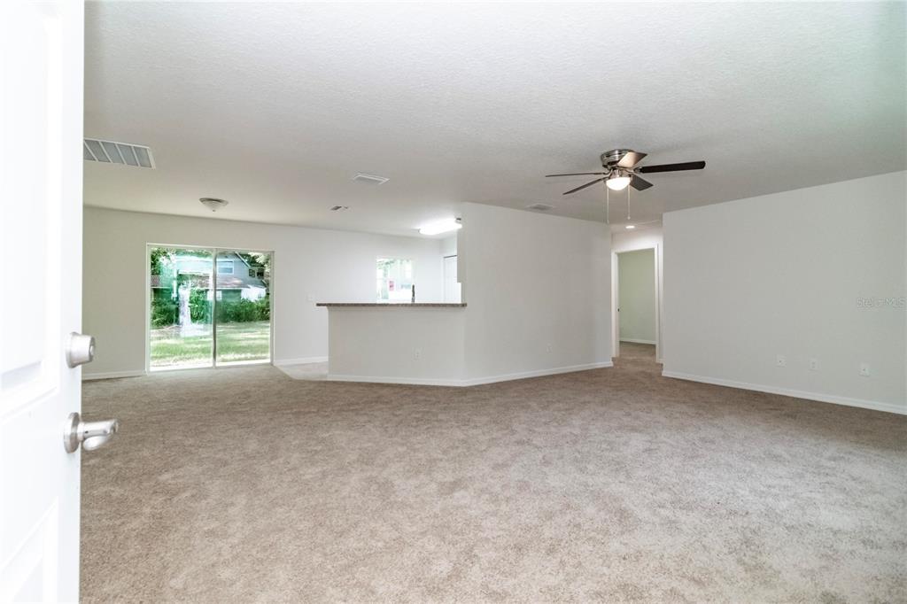 61 Larch Run Ocala, FL 34480 - Photo 2 of 26 a view of a livingroom with a fireplace