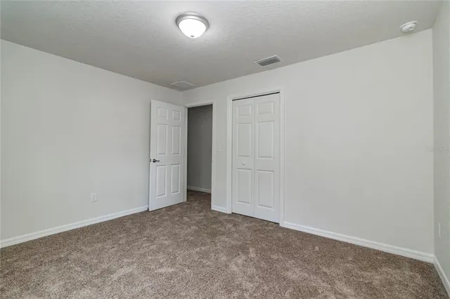 an empty room with an entryway