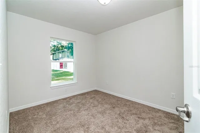 an empty room with a window