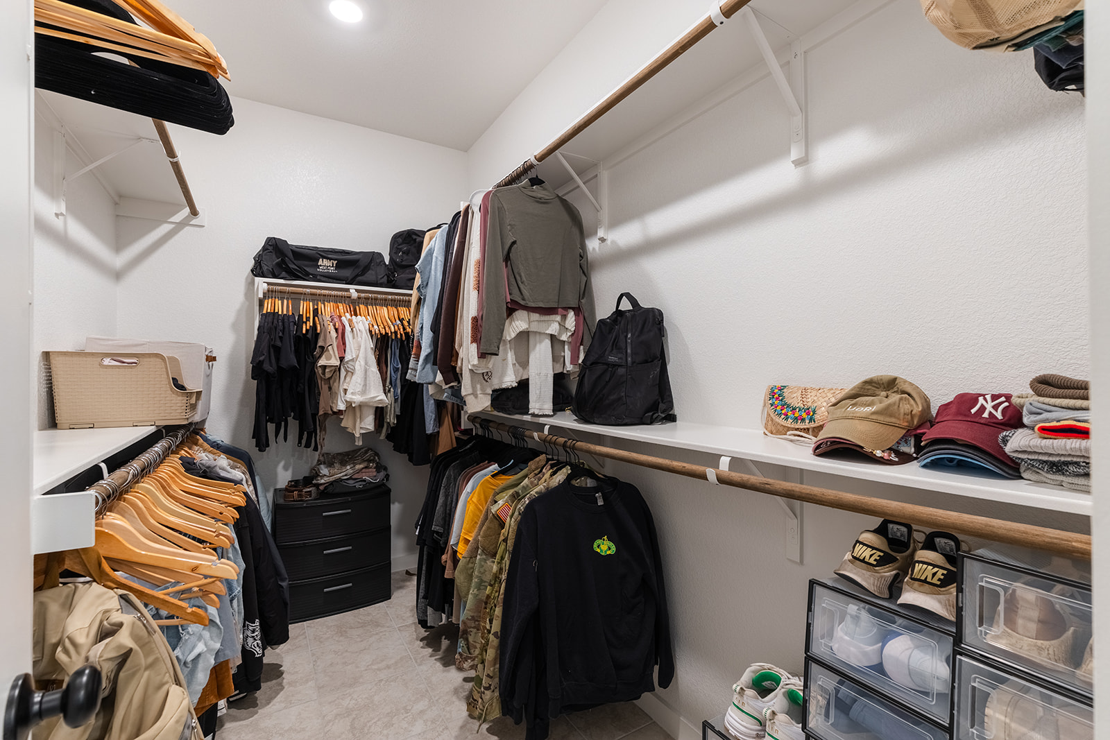 972 Leaning Oak Lane Georgetown, TX 78628 - Photo 17 of 33 a view of walk in closet with clothes and shoes