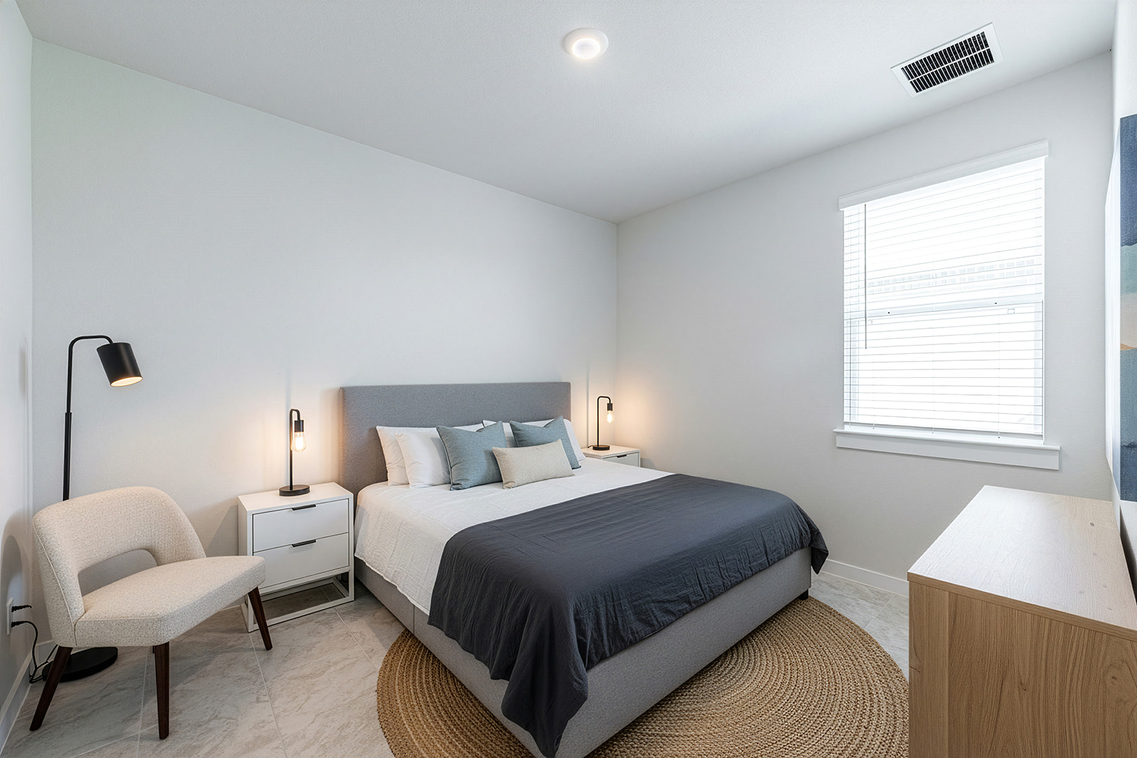972 Leaning Oak Lane Georgetown, TX 78628 - Photo 22 of 33 a bedroom with a bed and a couch