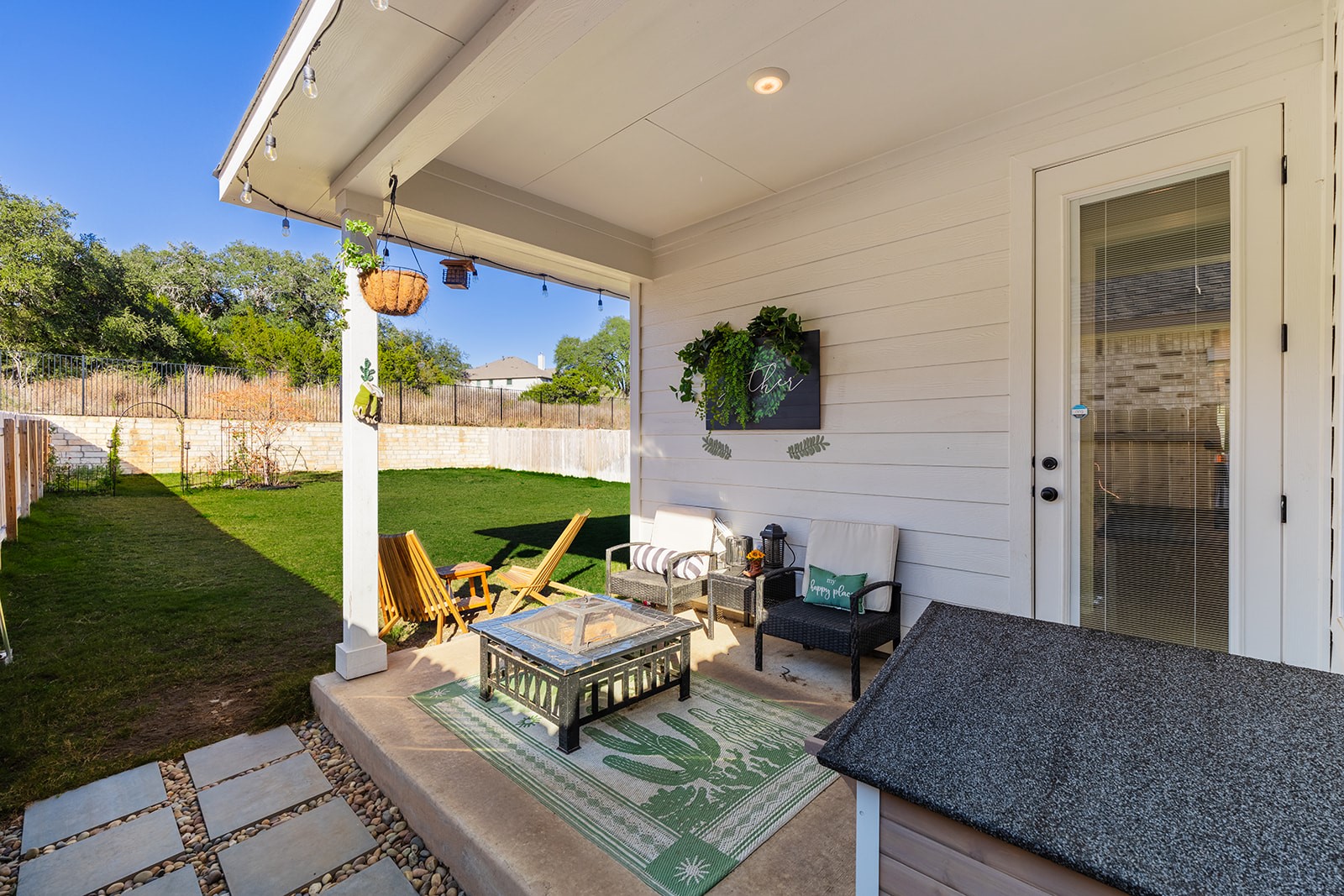 972 Leaning Oak Lane Georgetown, TX 78628 - Photo 24 of 33 a outdoor living space with furniture and garden
