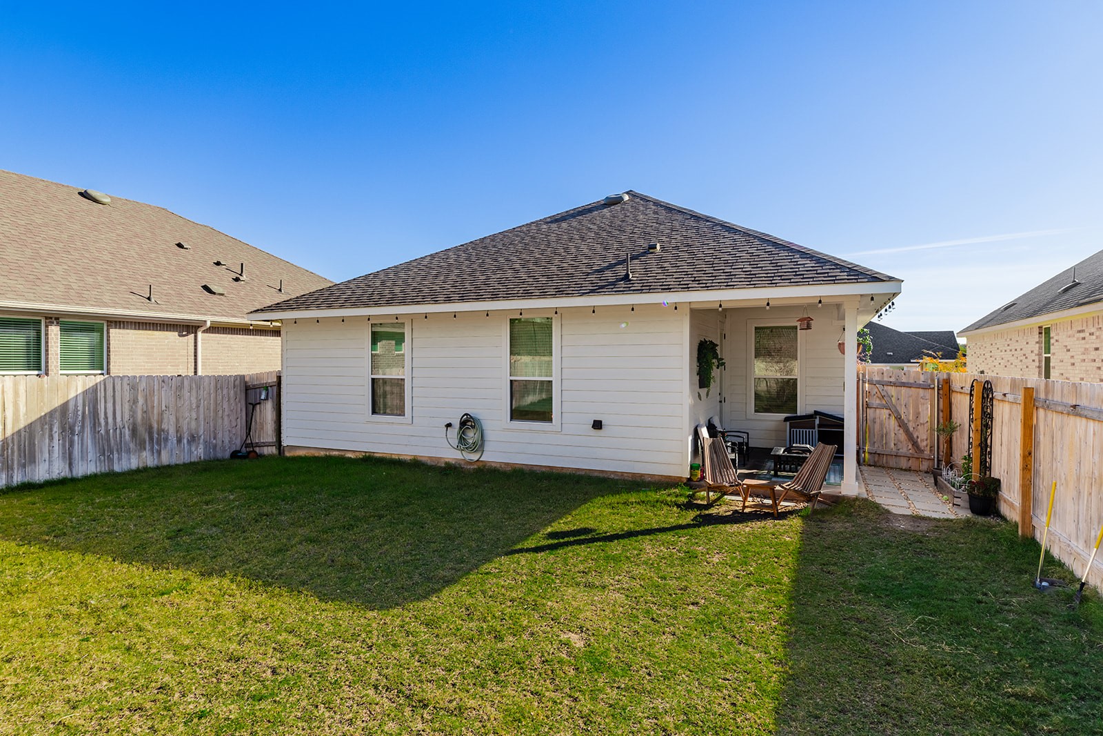 972 Leaning Oak Lane Georgetown, TX 78628 - Photo 26 of 33 a front view of a house with garden