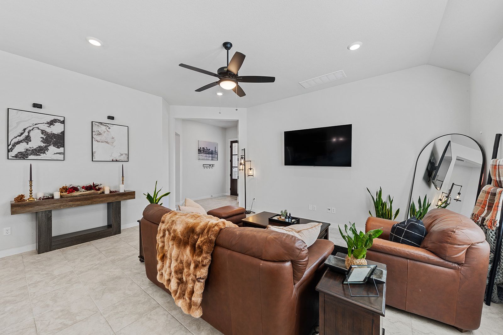 972 Leaning Oak Lane Georgetown, TX 78628 - Photo 6 of 33 a living room with furniture and a flat screen tv