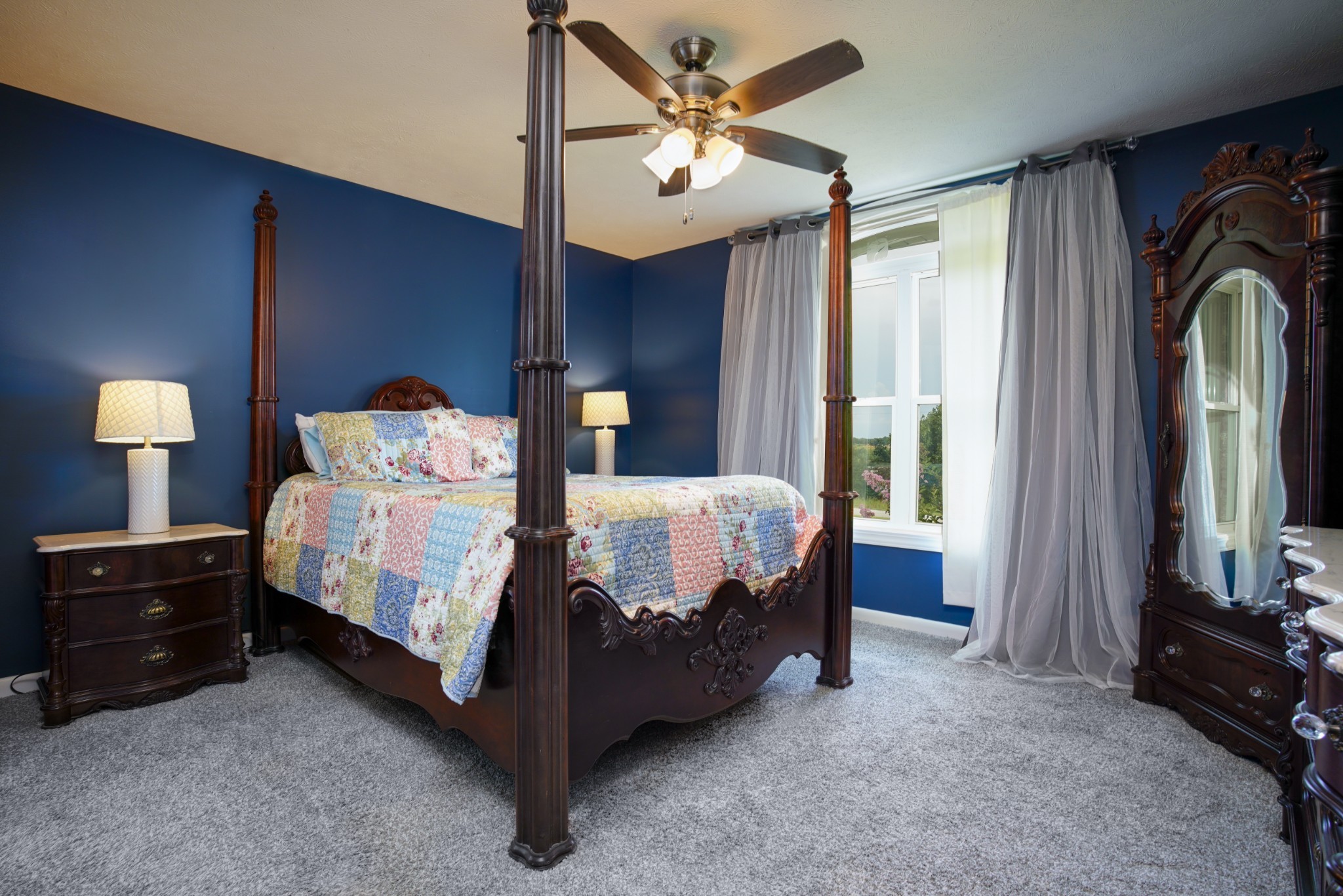 108 Eagle Drive Waynesboro, TN 38485 - Photo 11 of 29 a bedroom with a bed and a chandelier