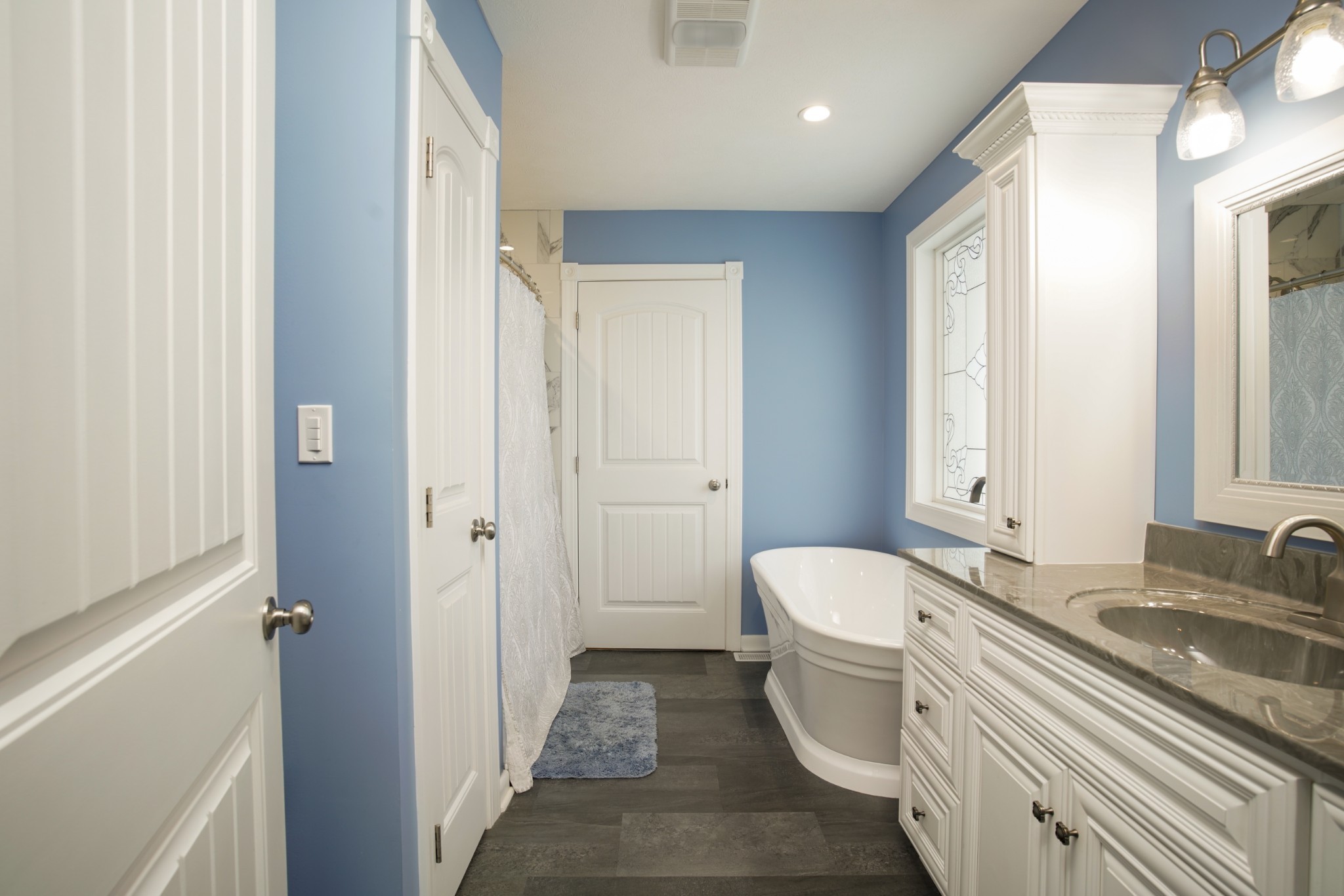 108 Eagle Drive Waynesboro, TN 38485 - Photo 12 of 29 a bathroom with a granite countertop double vanity sink a mirror and a shower