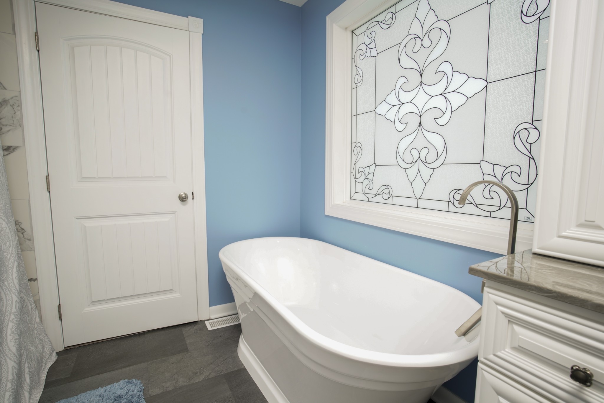 108 Eagle Drive Waynesboro, TN 38485 - Photo 14 of 29 a white bath tub sitting next to a white cabinet