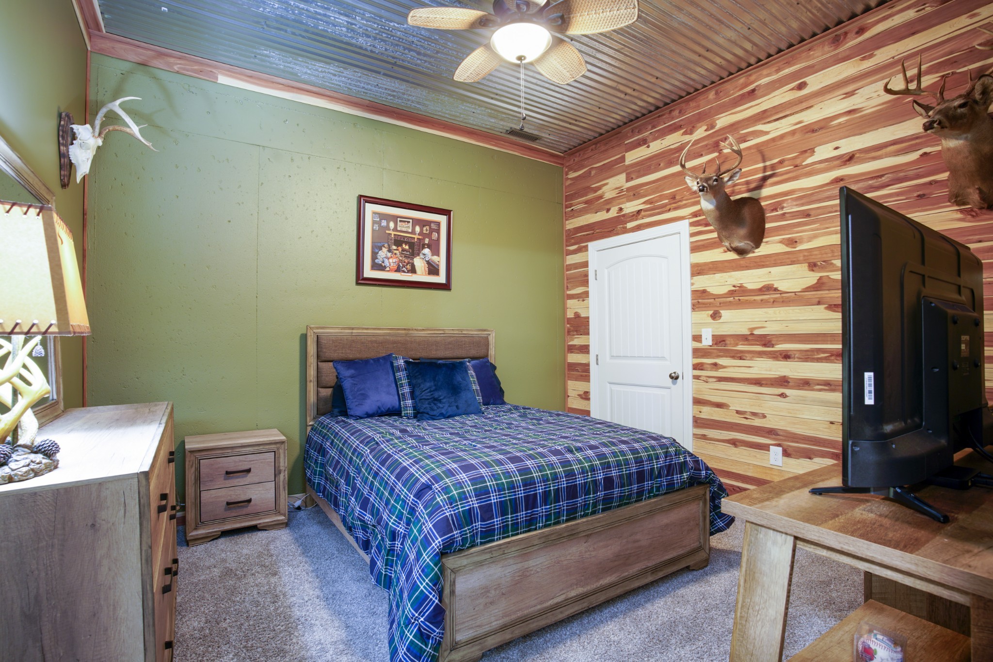 108 Eagle Drive Waynesboro, TN 38485 - Photo 20 of 29 a bedroom with a bed and a tv