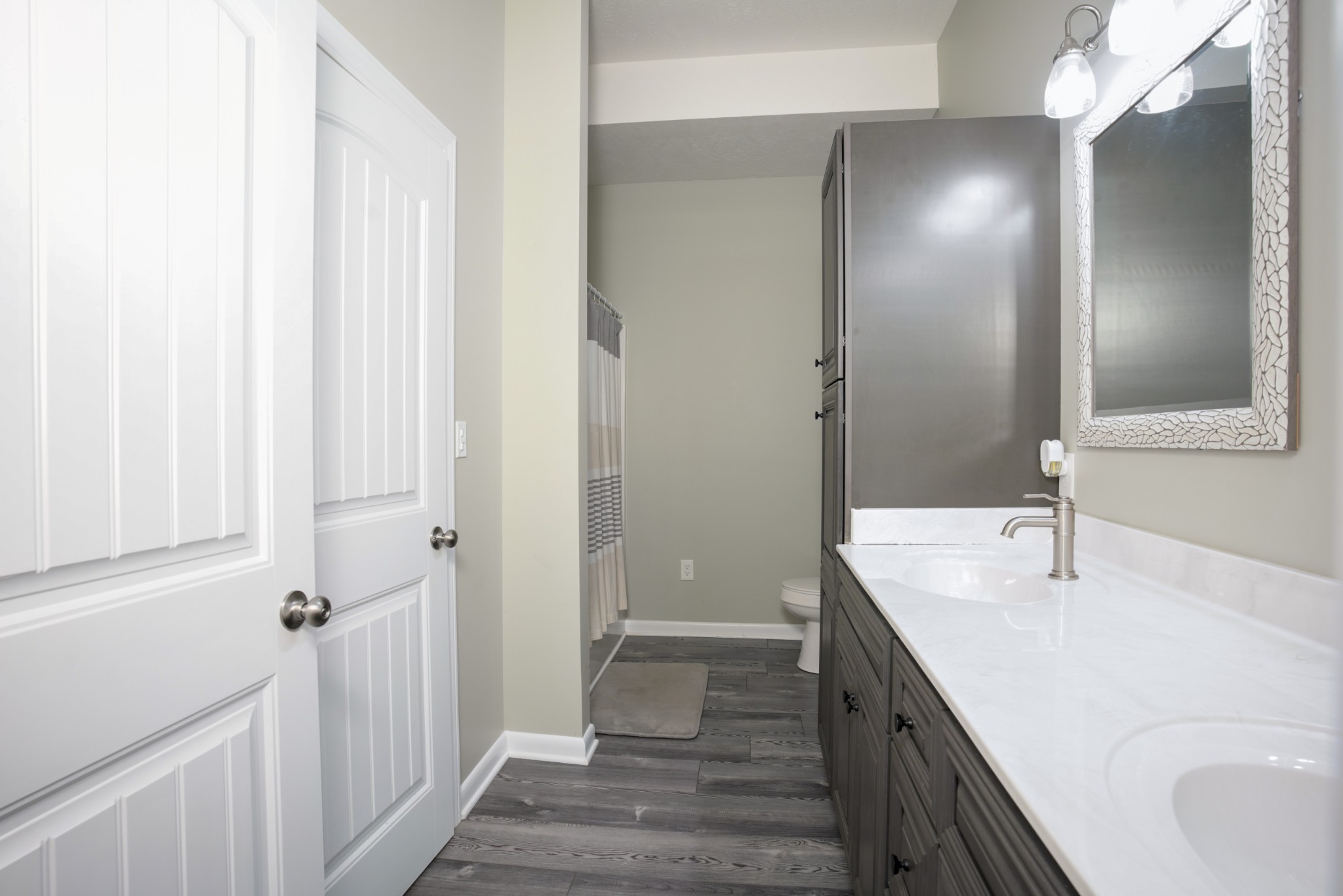 108 Eagle Drive Waynesboro, TN 38485 - Photo 21 of 29 a bathroom with a double vanity sink and mirror