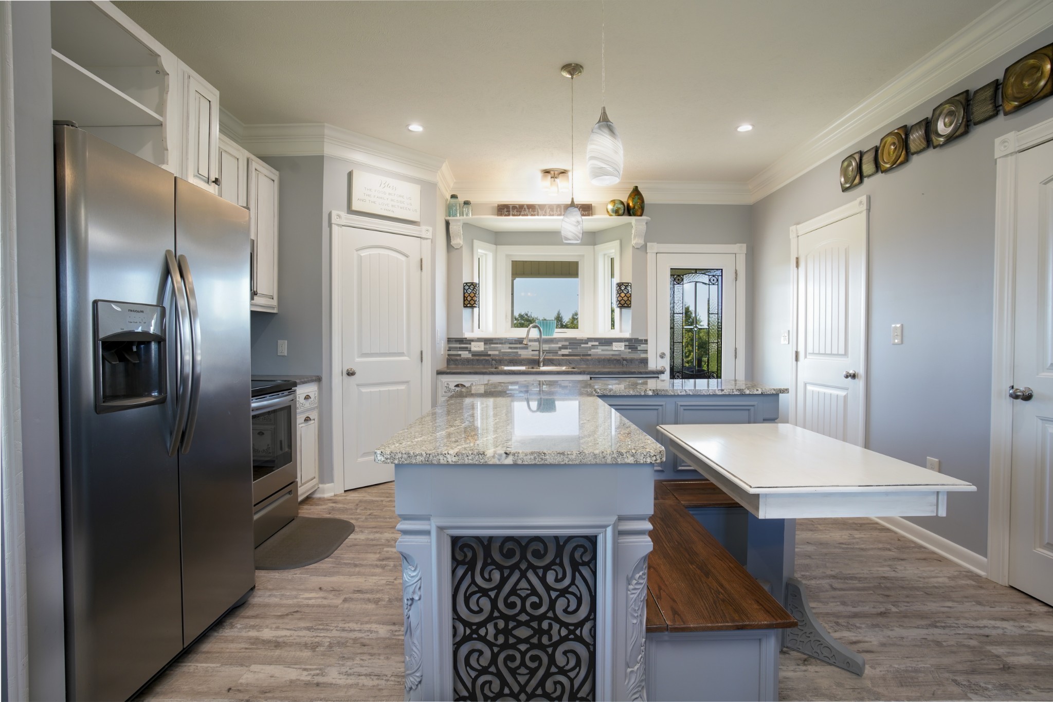108 Eagle Drive Waynesboro, TN 38485 - Photo 6 of 29 a kitchen with stainless steel appliances granite countertop a refrigerator and a sink