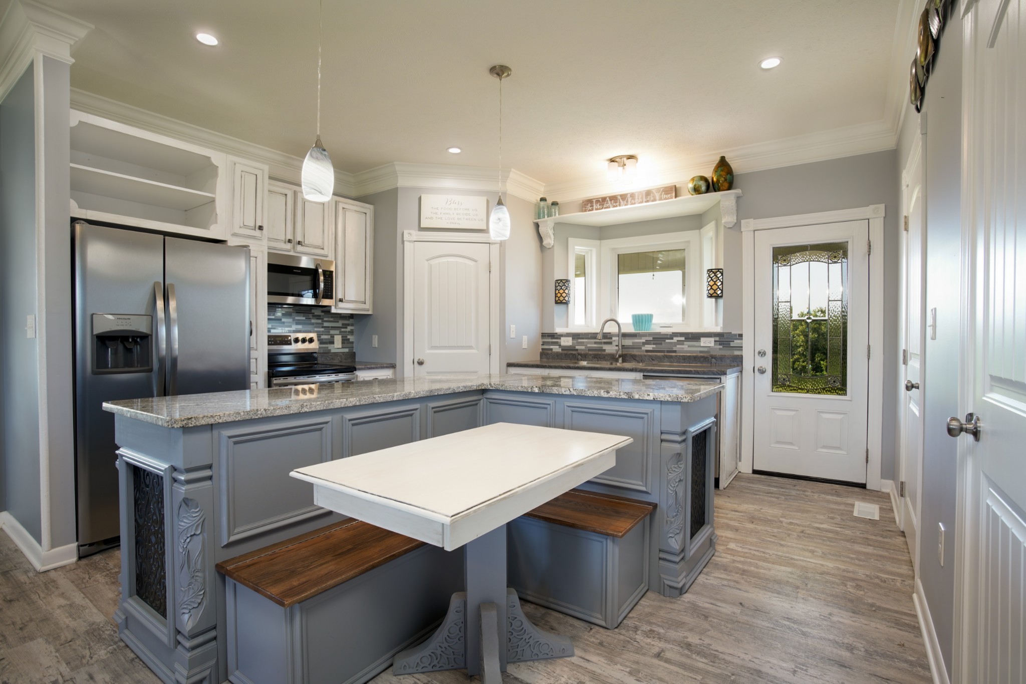 108 Eagle Drive Waynesboro, TN 38485 - Photo 7 of 29 a kitchen with kitchen island a sink stove and refrigerator