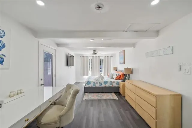 a view of a livingroom with furniture and windows