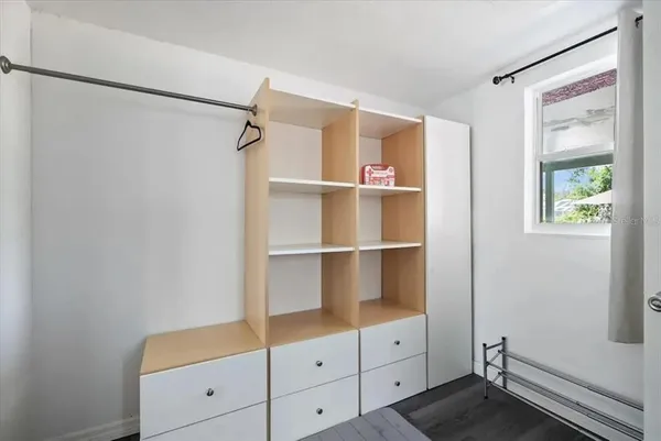 a view of an empty walk in closet