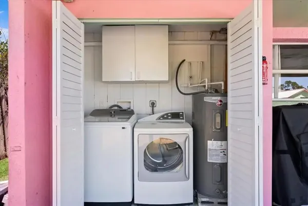 a utility room with dryer and washer