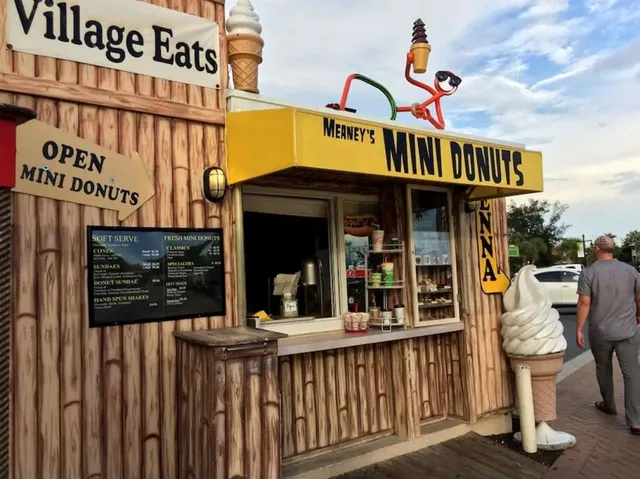 a view of street with sitting area