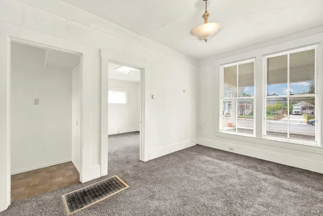 an empty room with windows